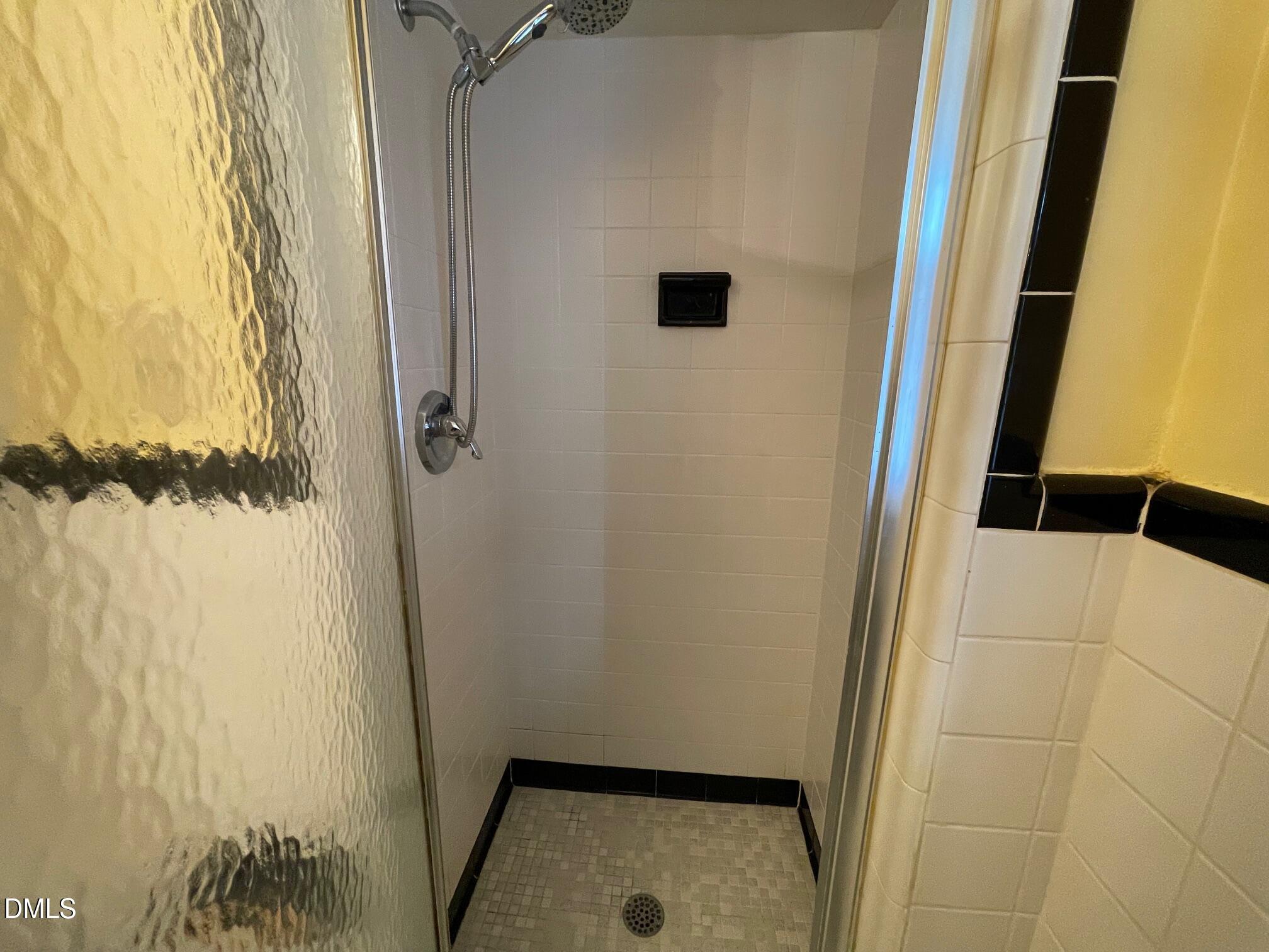 280 Montague Road Angier, NC 27501 - Photo 21 of 28 a bathroom with a granite countertop shower and a sink
