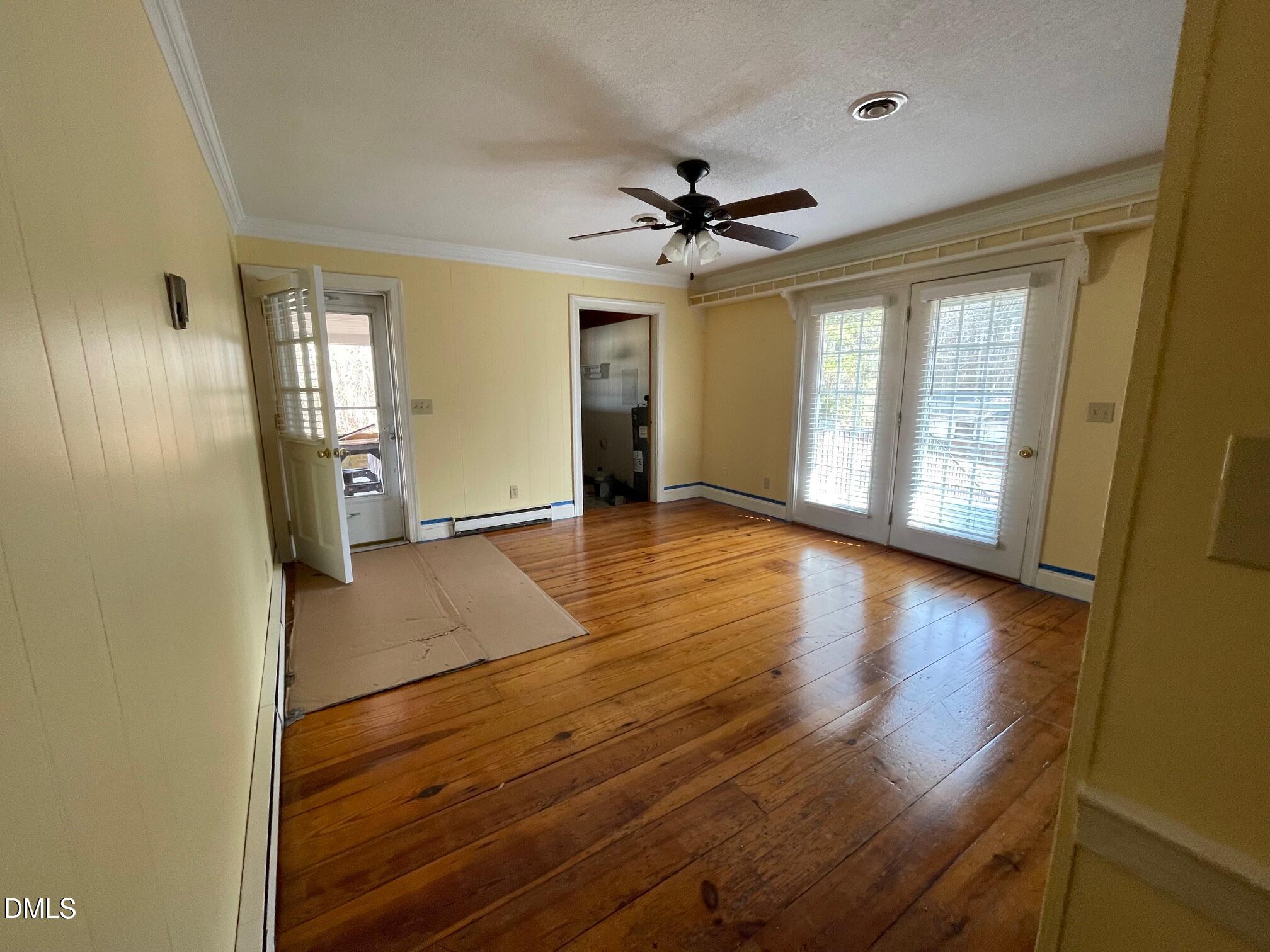 280 Montague Road Angier, NC 27501 - Photo 22 of 28 wooden floor in an empty room with a window