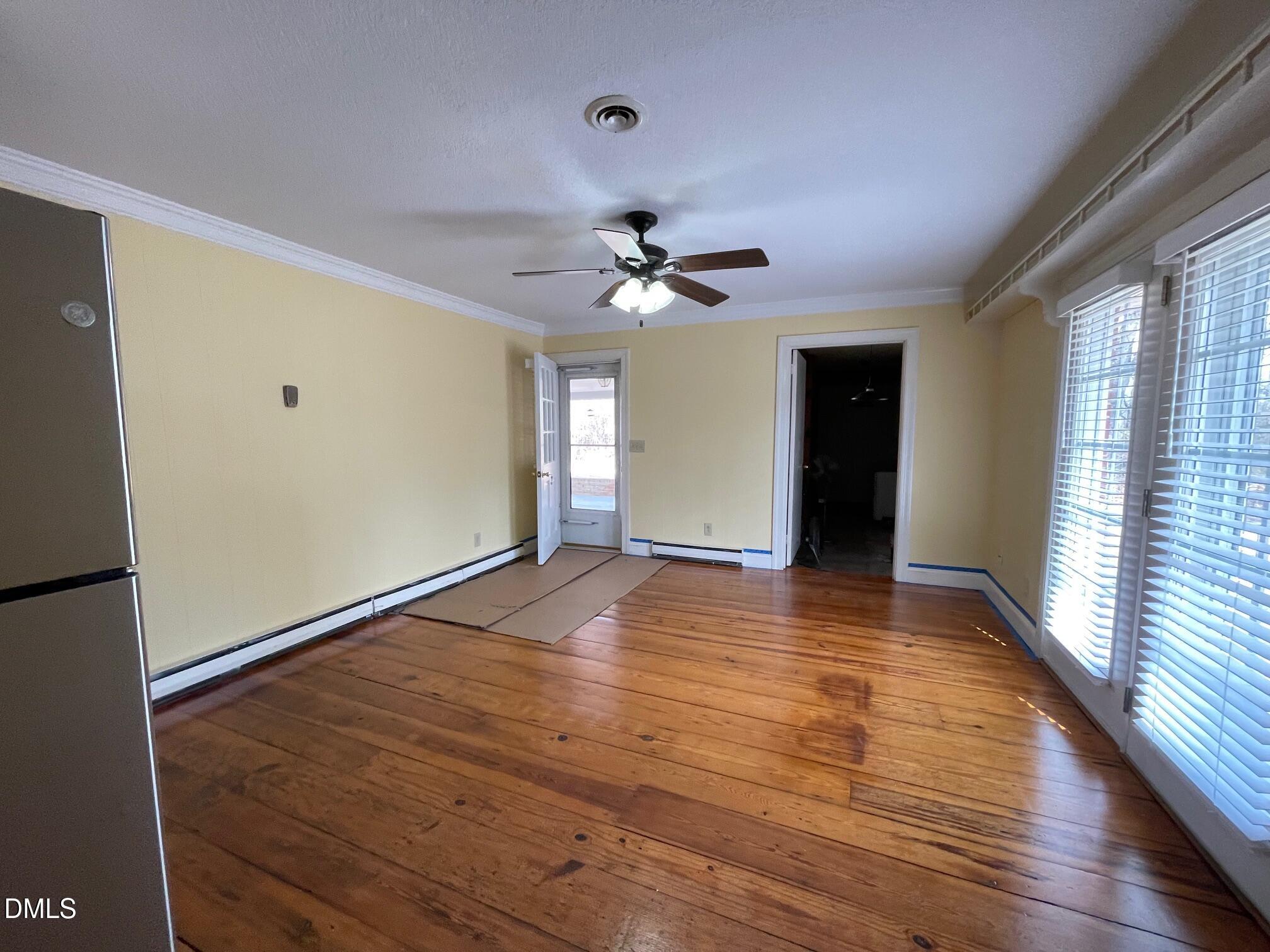 280 Montague Road Angier, NC 27501 - Photo 27 of 28 a view of an empty room with window and wooden floor