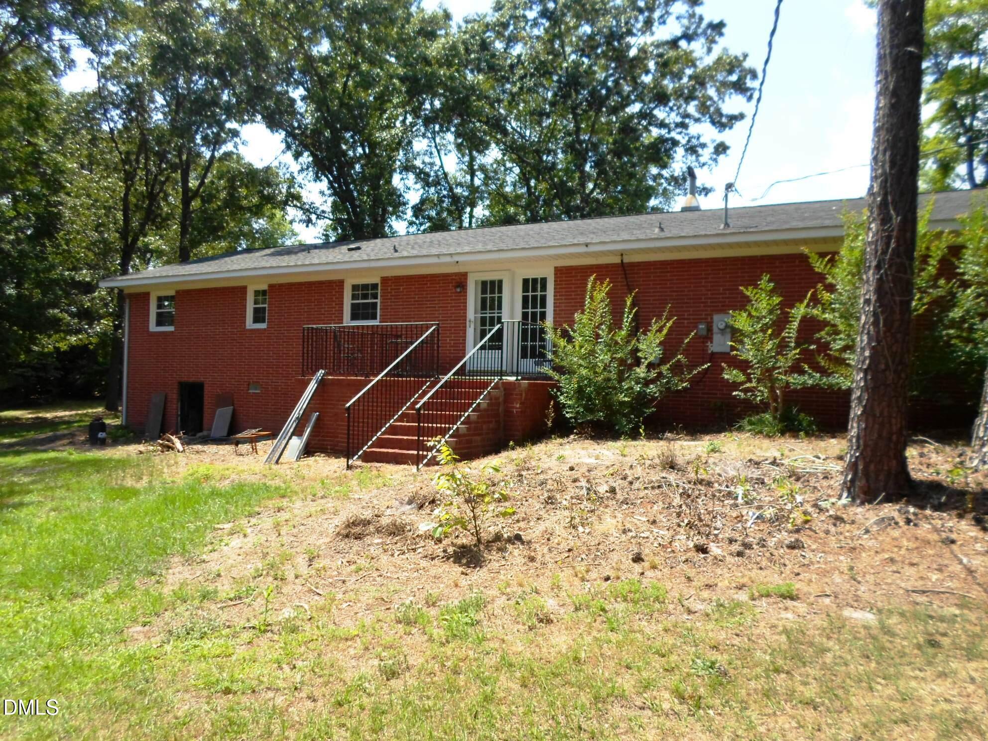 280 Montague Road Angier, NC 27501 - Photo 3 of 28 a view of a backyard of the house