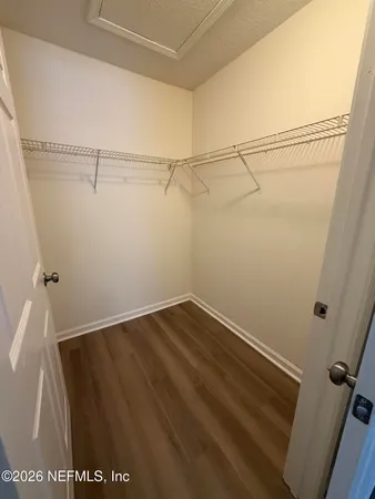a view of a room with racks on the wall