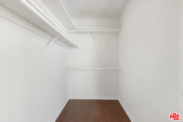 a view of a room with racks on the wall