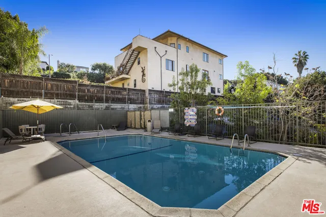 a view of a house with a swimming pool
