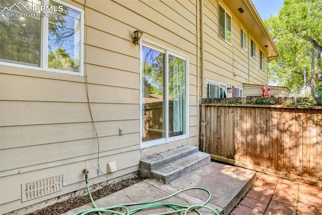 a view of a house with a street