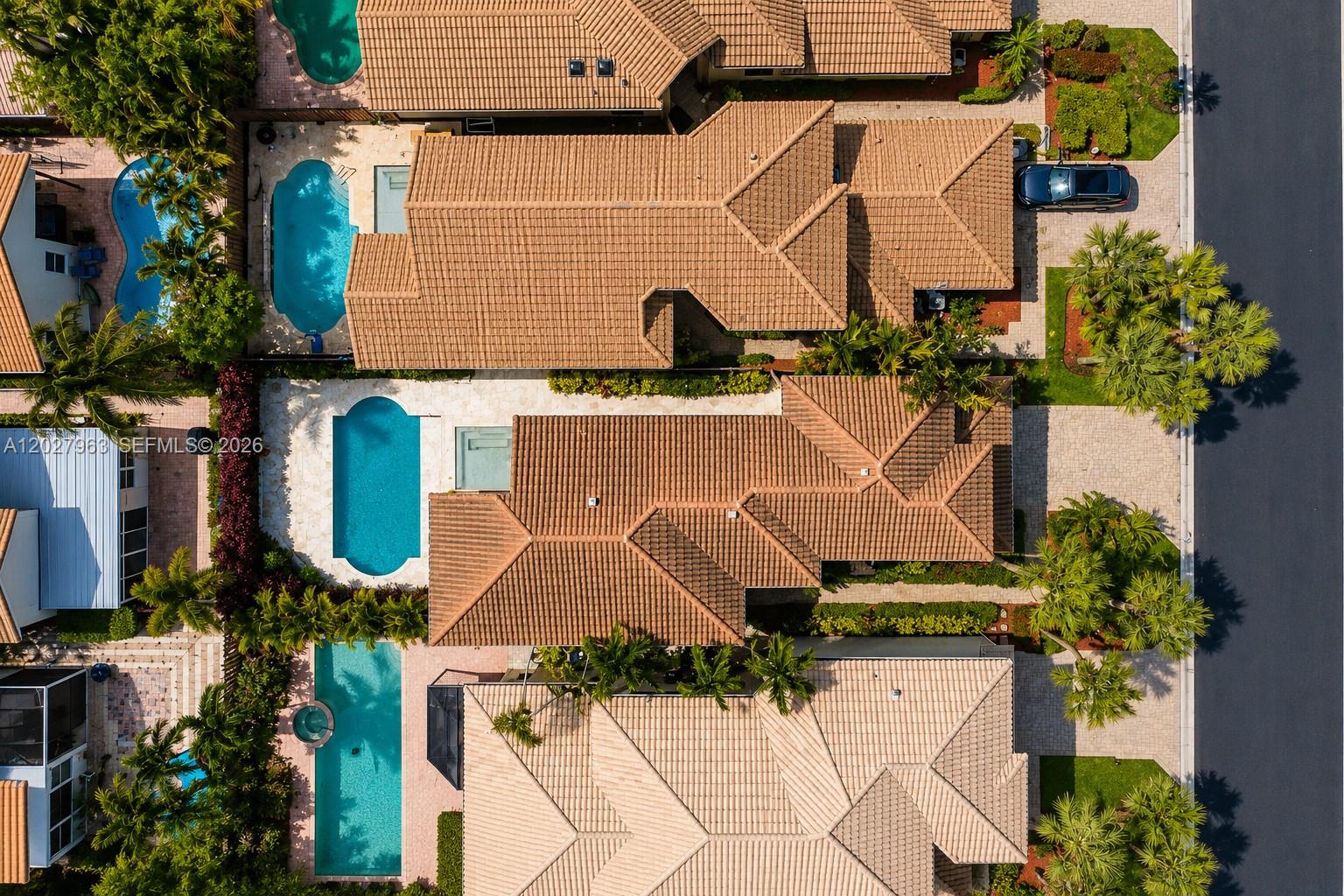 6646 Northwest 25th Terrace Boca Raton, FL 33496 - Photo 43 of 48 an aerial view of a house with a yard