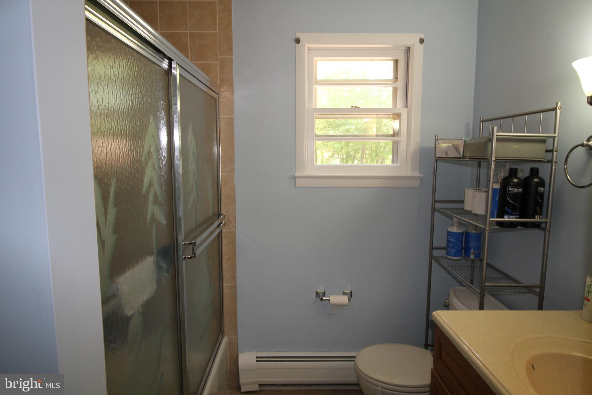 21 Carranza Road Tabernacle, NJ 08088 - Photo 22 of 50 a bathroom with a toilet and a shower