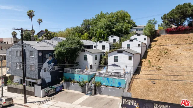 a front view of a building with outdoor seating
