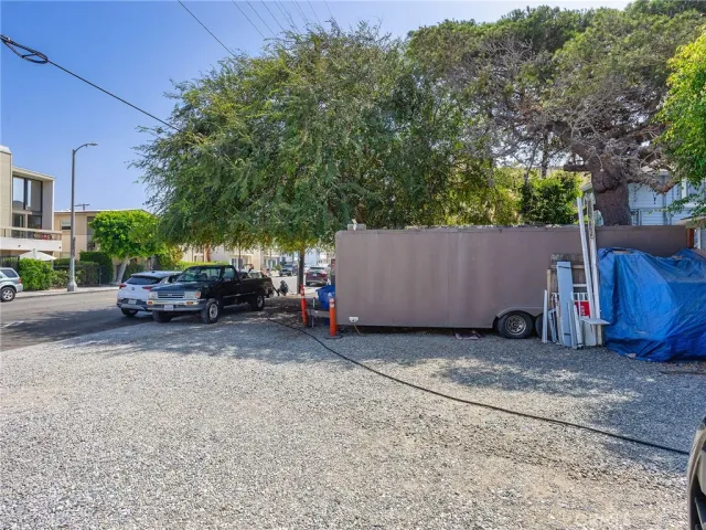 a view of a car parked in front of a house