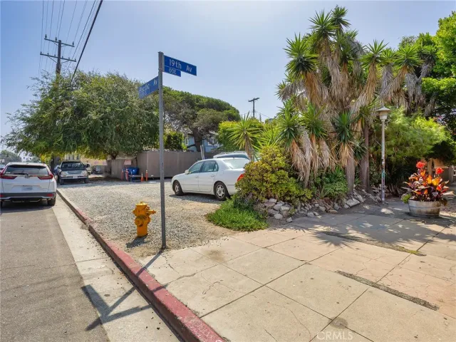 a view of a street with cars