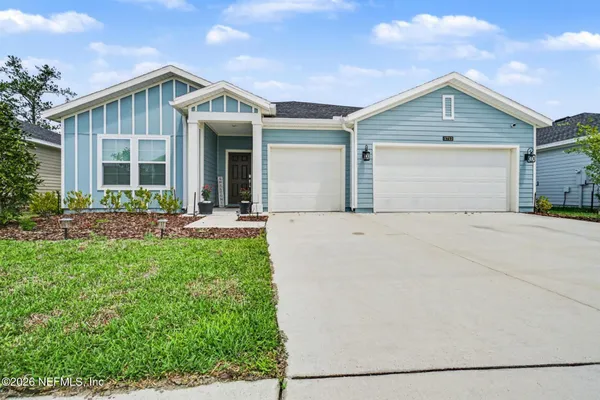 front view of a house with yard