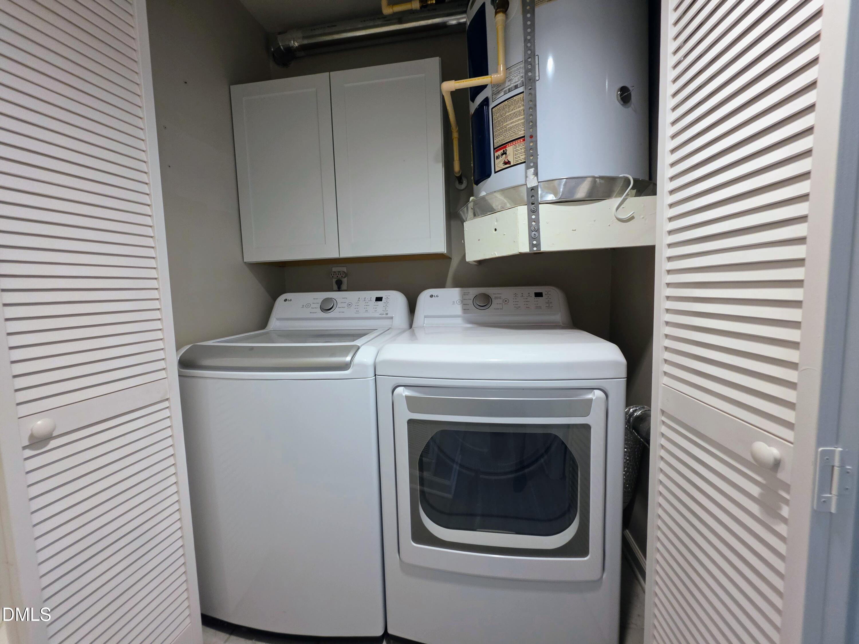 3803 Chimney Ridge Place, Unit 4 Durham, NC 27713 - Photo 12 of 16 a utility room with dryer and washer