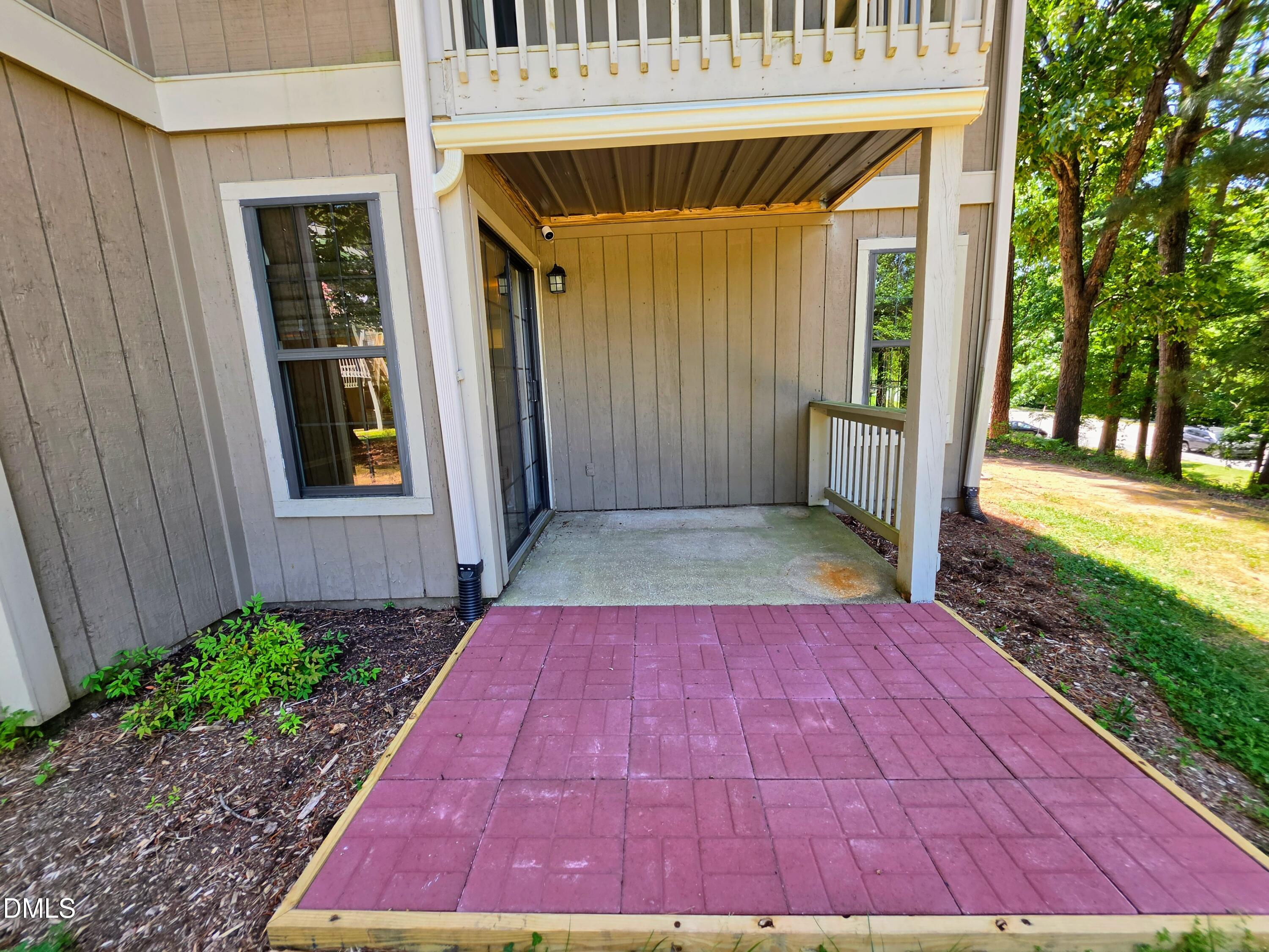 3803 Chimney Ridge Place, Unit 4 Durham, NC 27713 - Photo 14 of 16 a view of a backyard with a garden