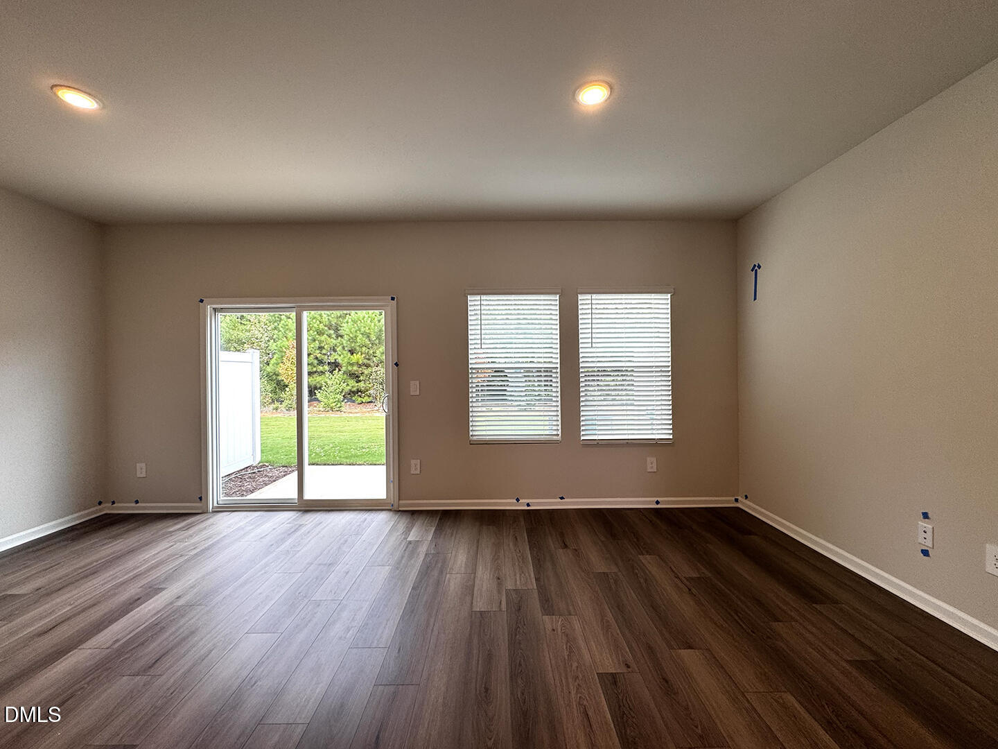 1007 Winding Spg Drive Mebane, NC 27302 - Photo 14 of 32 a view of an empty room with wooden floor and a window