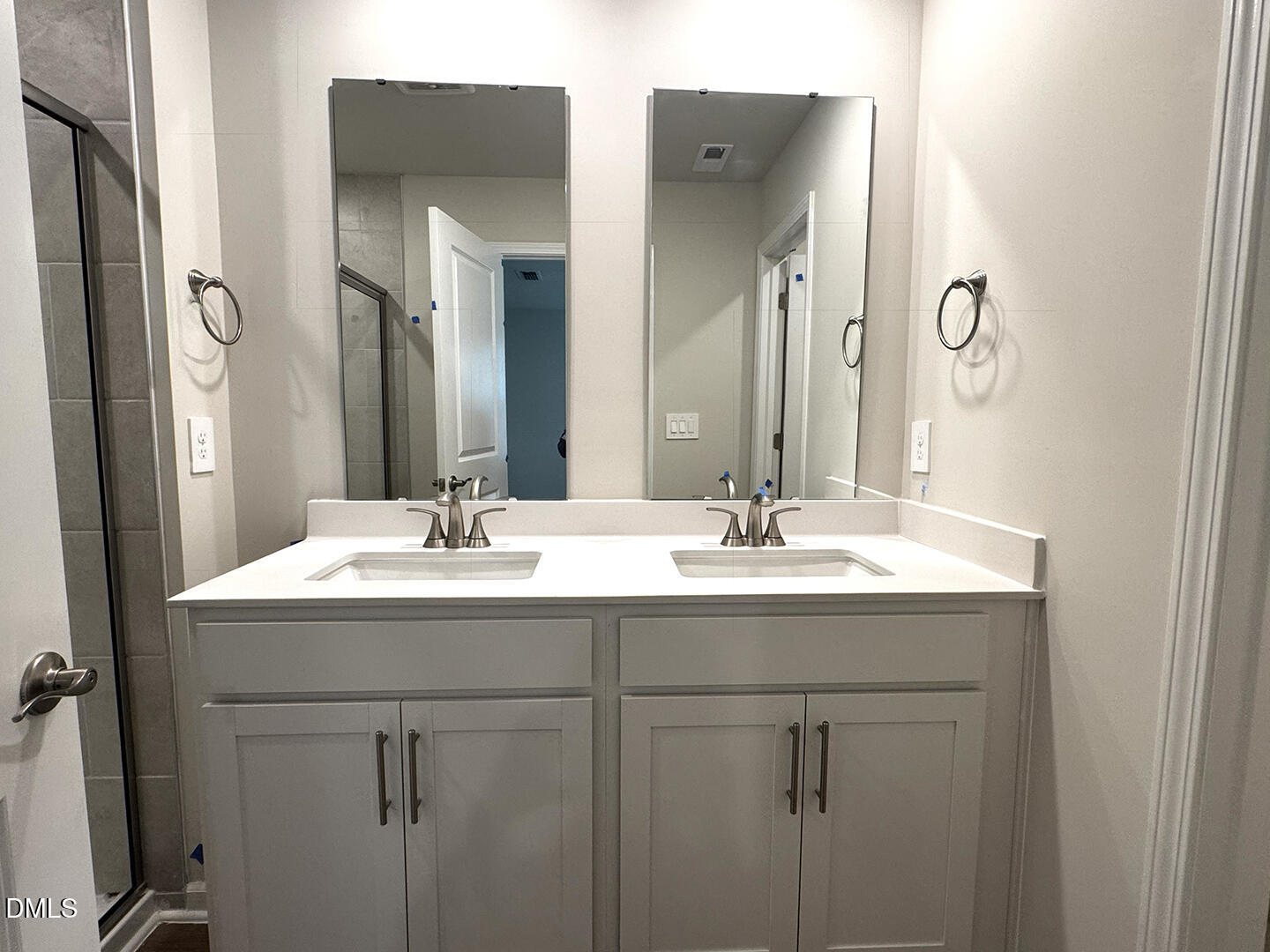 1007 Winding Spg Drive Mebane, NC 27302 - Photo 26 of 32 a bathroom with a sink and a mirror