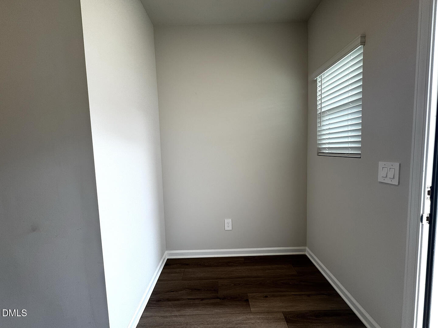 1007 Winding Spg Drive Mebane, NC 27302 - Photo 5 of 32 a view of a small space with wooden floor and a window