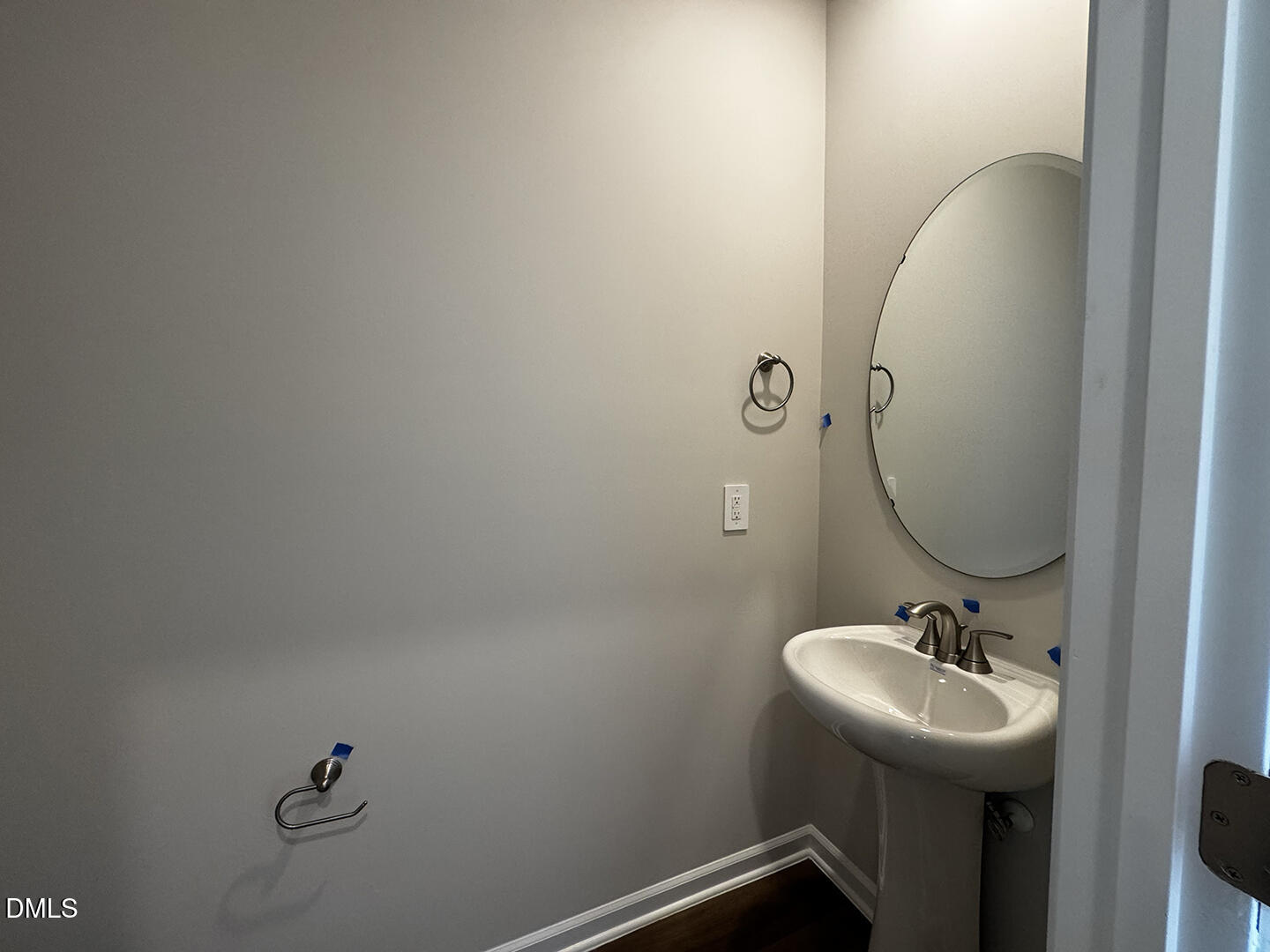 1007 Winding Spg Drive Mebane, NC 27302 - Photo 6 of 32 a bathroom with a sink and mirror