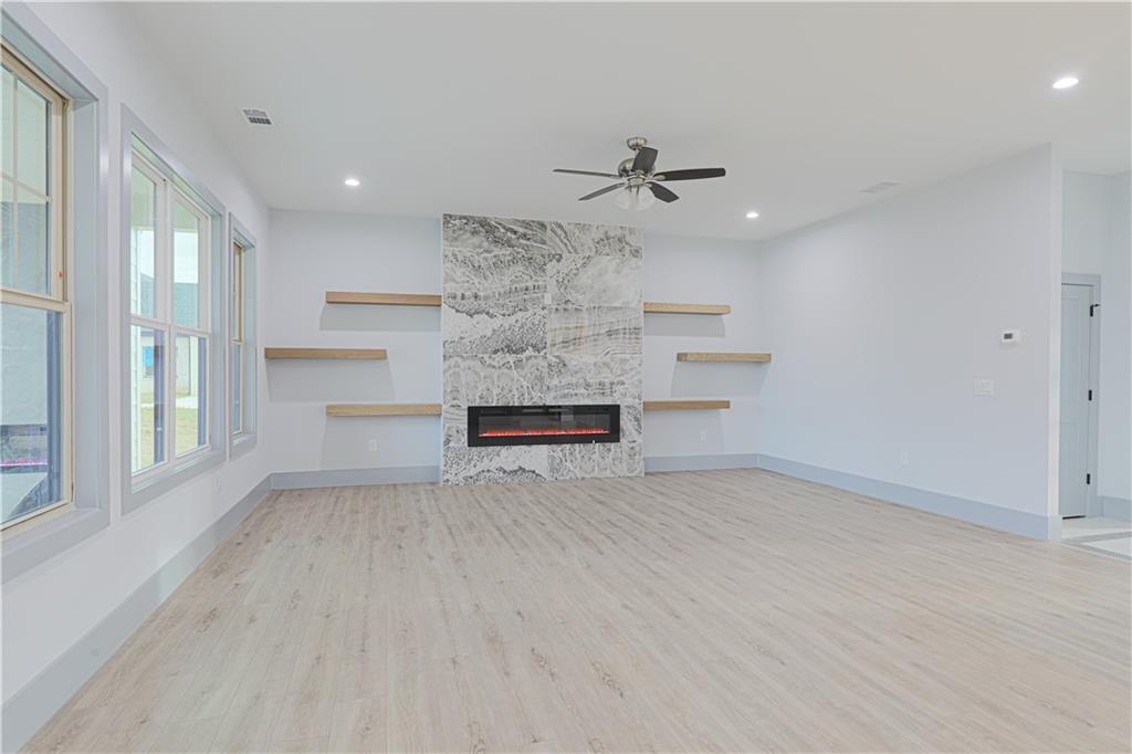 1341 Wheeler Creek Road Maysville, GA 30558 - Photo 14 of 65 a view of empty room with kitchen and window