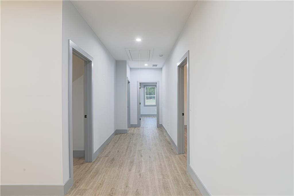 1341 Wheeler Creek Road Maysville, GA 30558 - Photo 40 of 65 a view of hallway with wooden floor