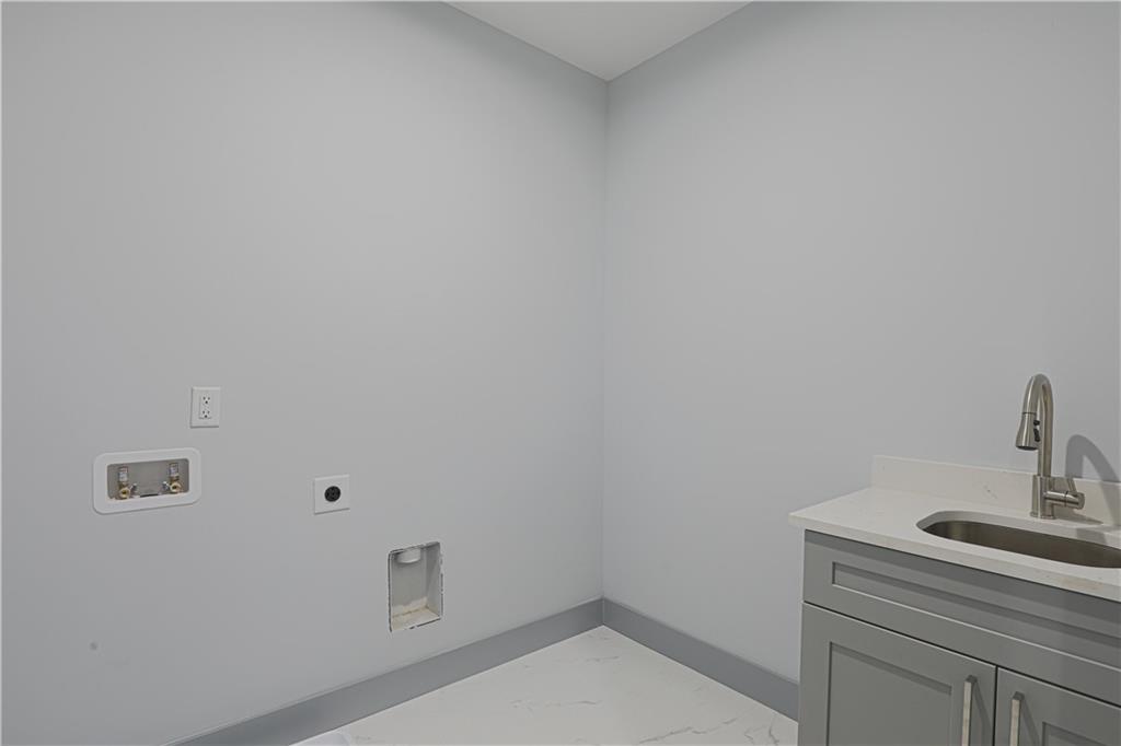 1341 Wheeler Creek Road Maysville, GA 30558 - Photo 54 of 65 a bathroom with a sink and vanity