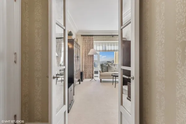 a spacious bathroom with a granite countertop sink mirror and shower
