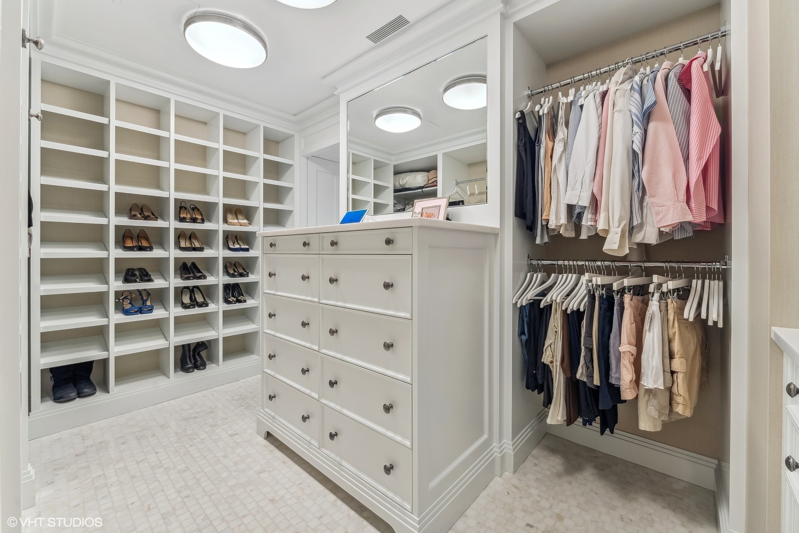 800 North Michigan Avenue, Unit 3501 Chicago, IL 60611 - Photo 45 of 57 a view of walk in closet with clothes and shoes