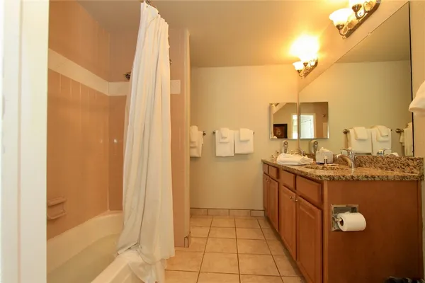 a room with a washing machine and sink