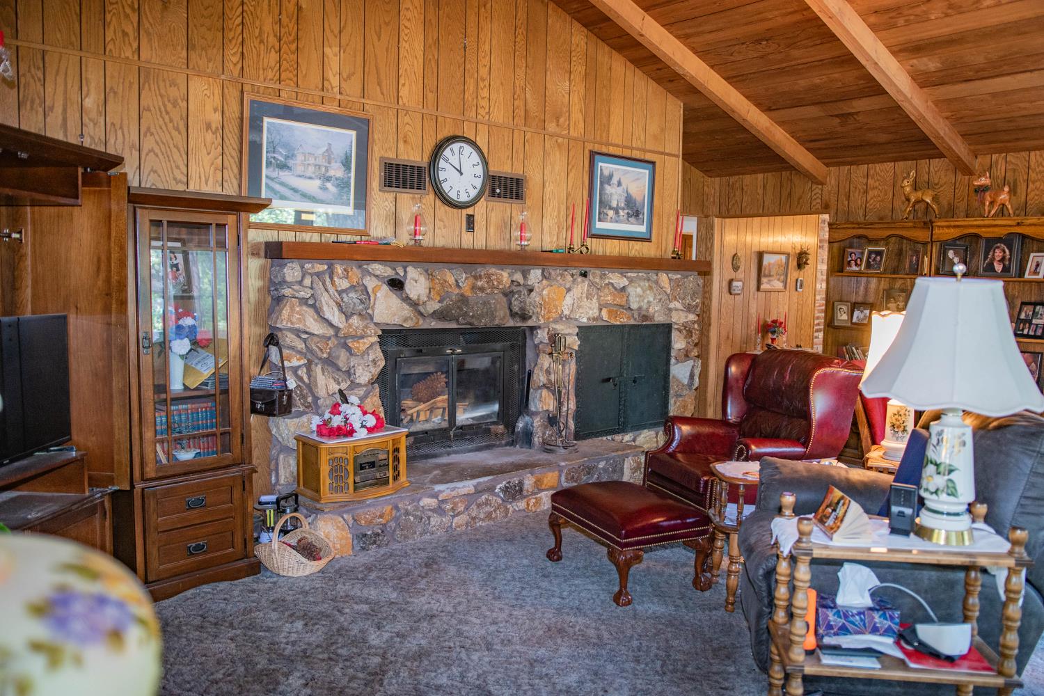 7380 Wentworth Springs Road Georgetown, CA 95634 - Photo 5 of 48 a living room with furniture and a fireplace