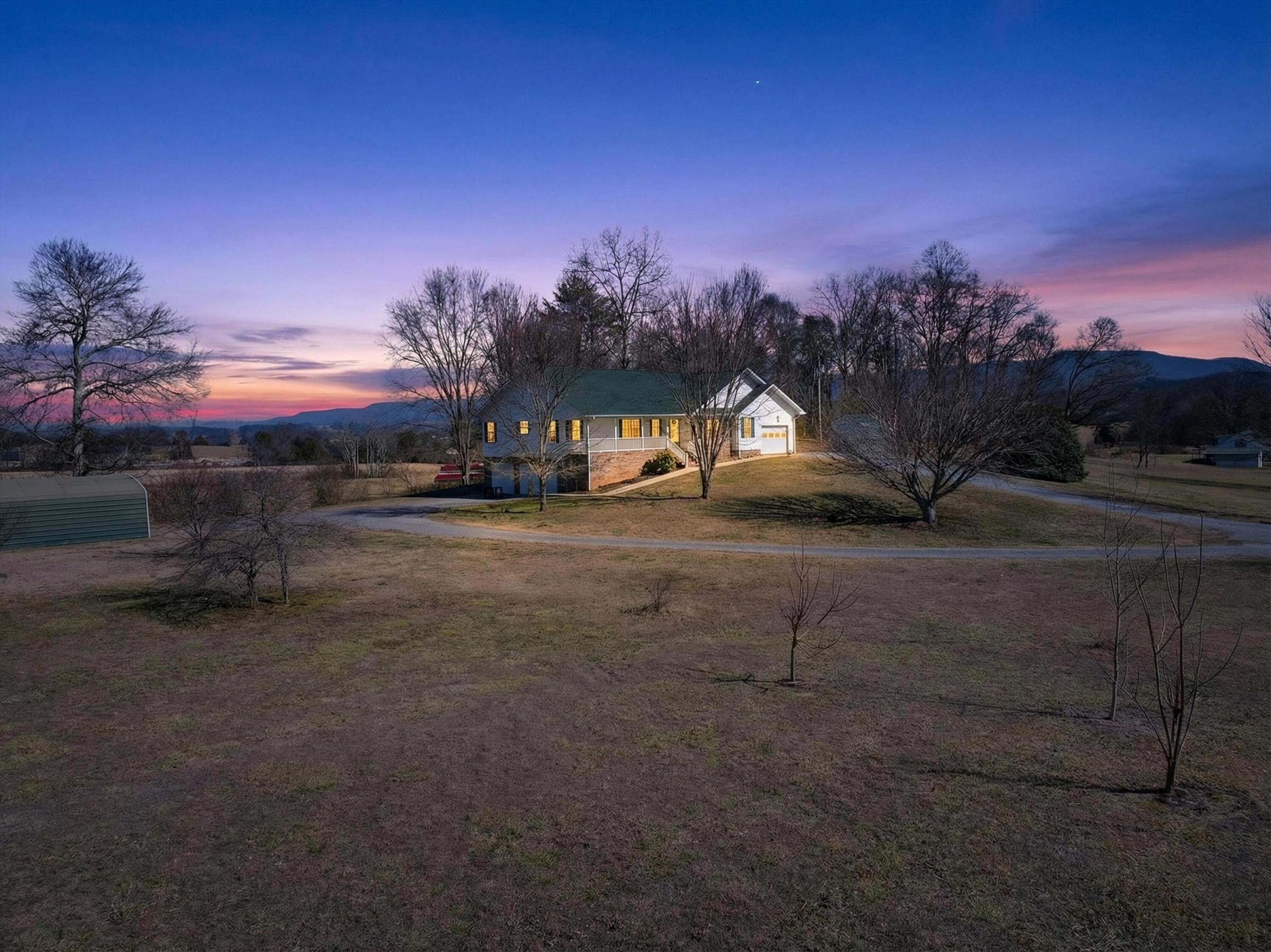202 Austin Road Dunlap, TN 37327 - Photo 2 of 55 02-DJI_20260209132029_0194_D#twilight