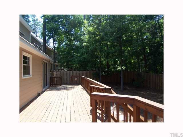6617 Rainwater Road Raleigh, NC 27615 - Photo 9 of 12 Outside, the 36' Deck overlooks the fenced backyard and is great for relaxing & dining! The sunken hot tub is screened from the neighbors for privacy.
