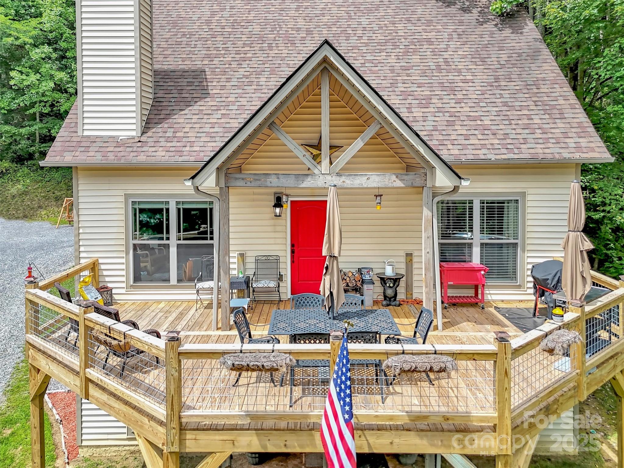 4823 Max Patch Road Clyde, NC 28721 - Photo 22 of 47 a view of house with outdoor space