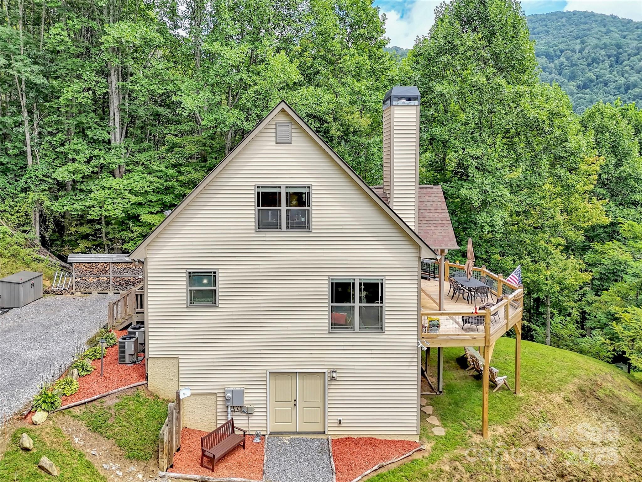 4823 Max Patch Road Clyde, NC 28721 - Photo 30 of 47 a view of a yard in front of house