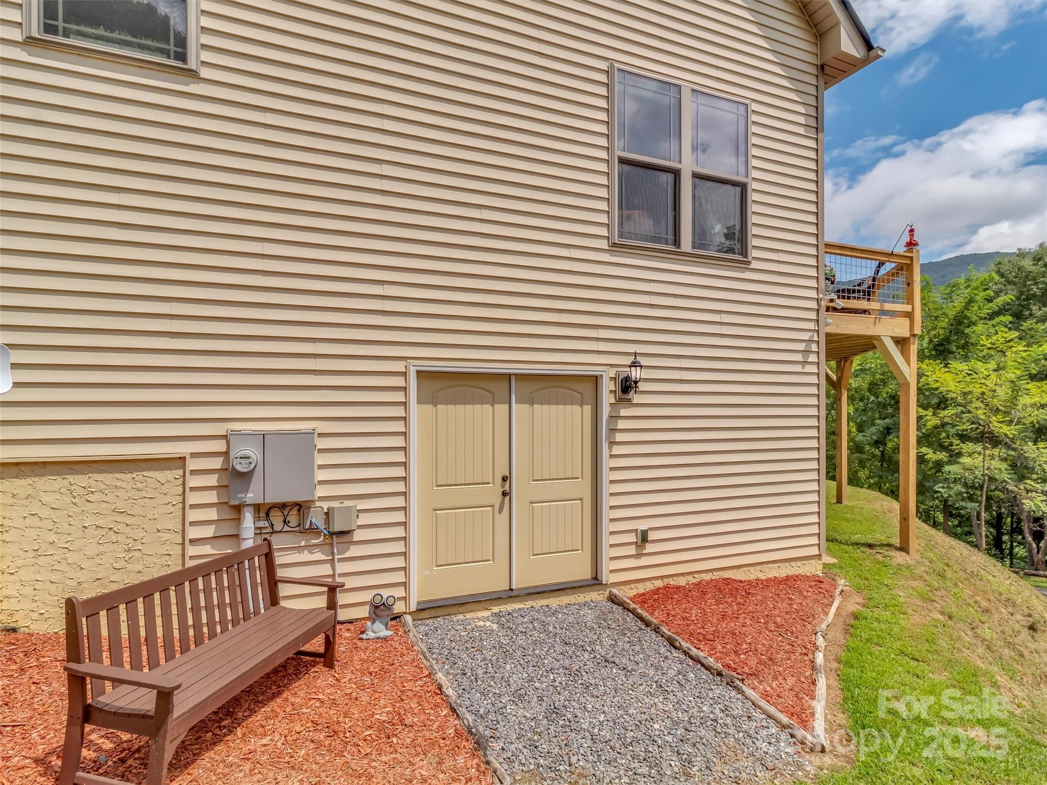 4823 Max Patch Road Clyde, NC 28721 - Photo 31 of 47 a view of a house with a white door