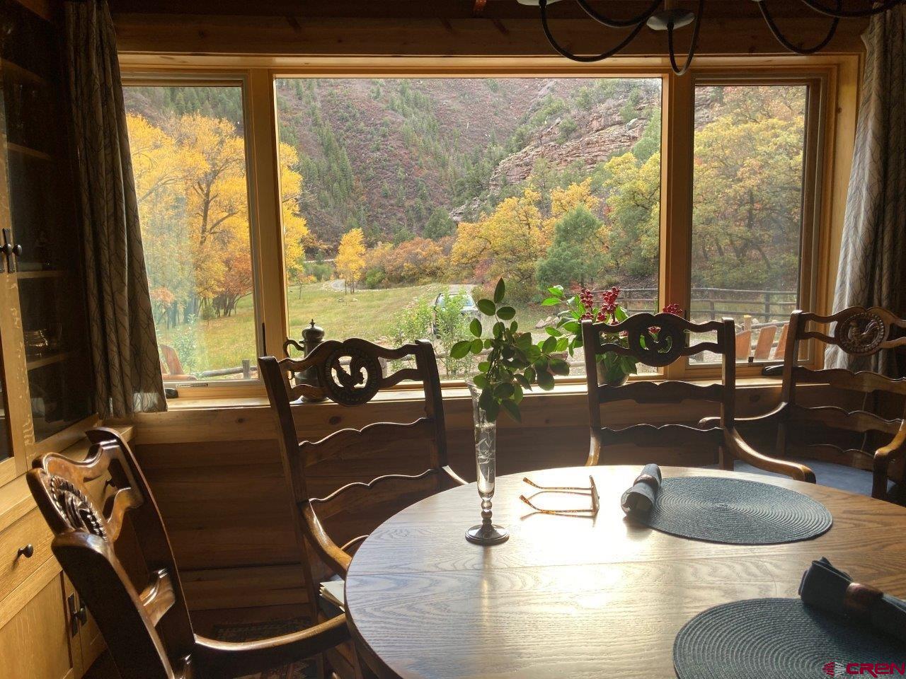 68 Sanborn Park Road Norwood, CO 81423 - Photo 19 of 33 a dining table with wooden floor