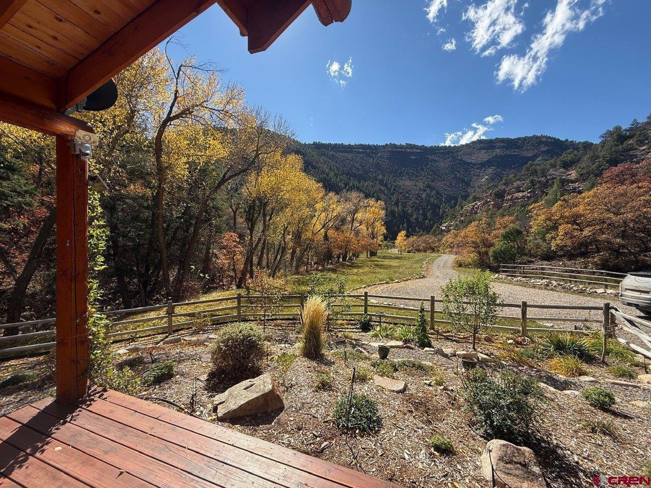 68 Sanborn Park Road Norwood, CO 81423 - Photo 9 of 33 a view of a yard with a tree