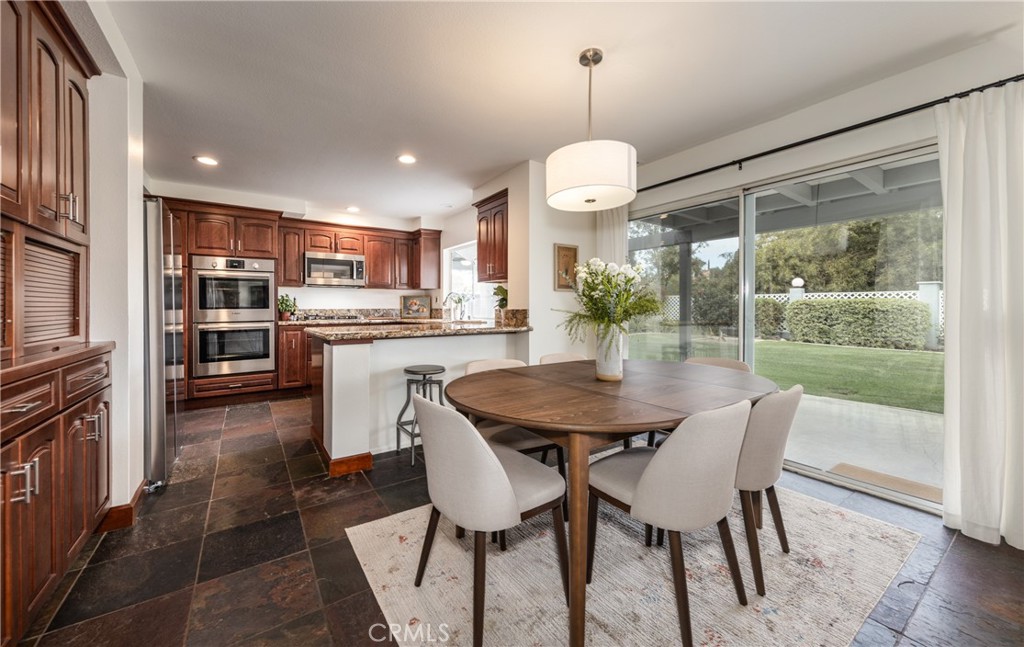 1951 Annapolis Circle Corona, CA 92881 - Photo 14 of 42 a view of a dining room and livingroom view
