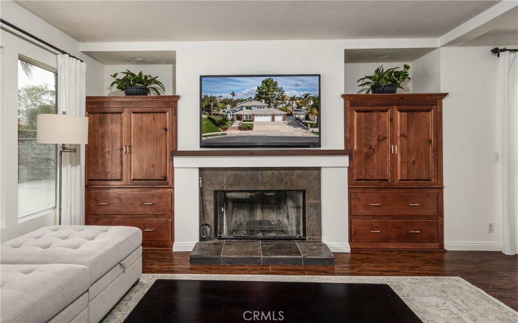 1951 Annapolis Circle Corona, CA 92881 - Photo 15 of 42 a living room with furniture and a fireplace