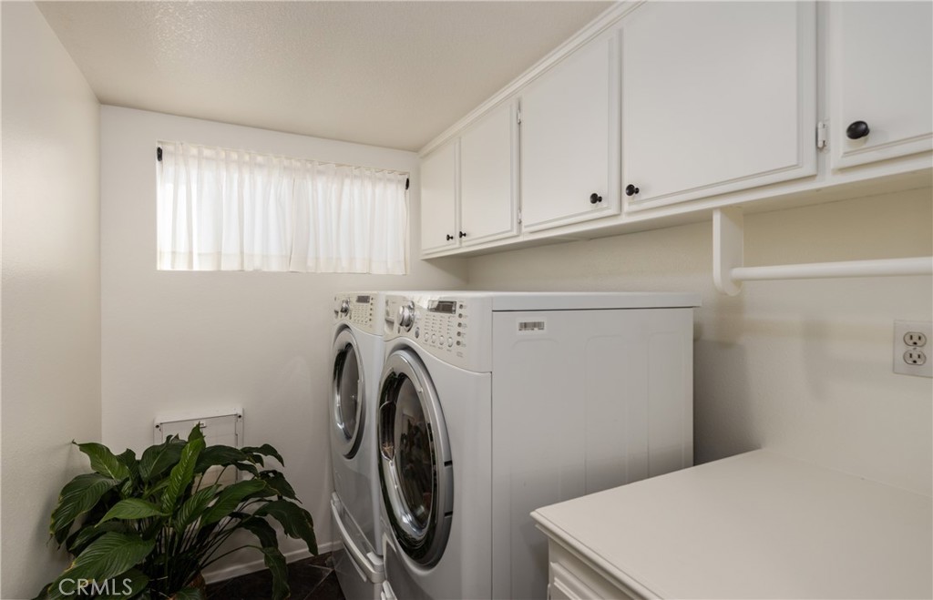 1951 Annapolis Circle Corona, CA 92881 - Photo 18 of 42 a utility room with dryer and washer