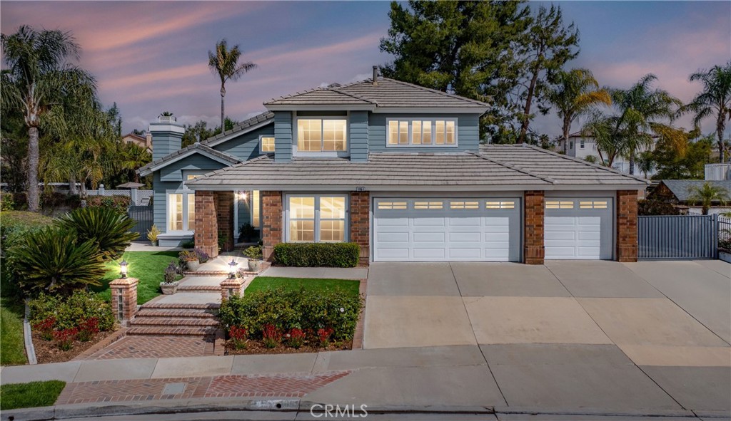 1951 Annapolis Circle Corona, CA 92881 - Photo 3 of 42 a front view of a house with garden