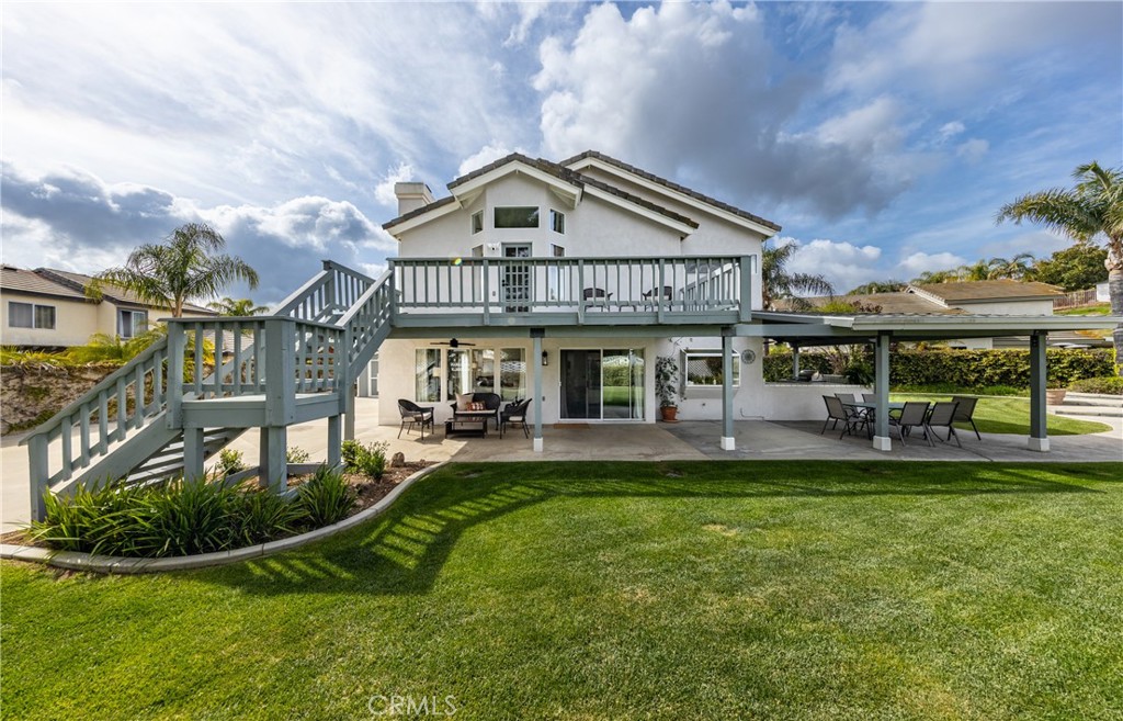 1951 Annapolis Circle Corona, CA 92881 - Photo 33 of 42 a view of a house with swimming pool and sitting area