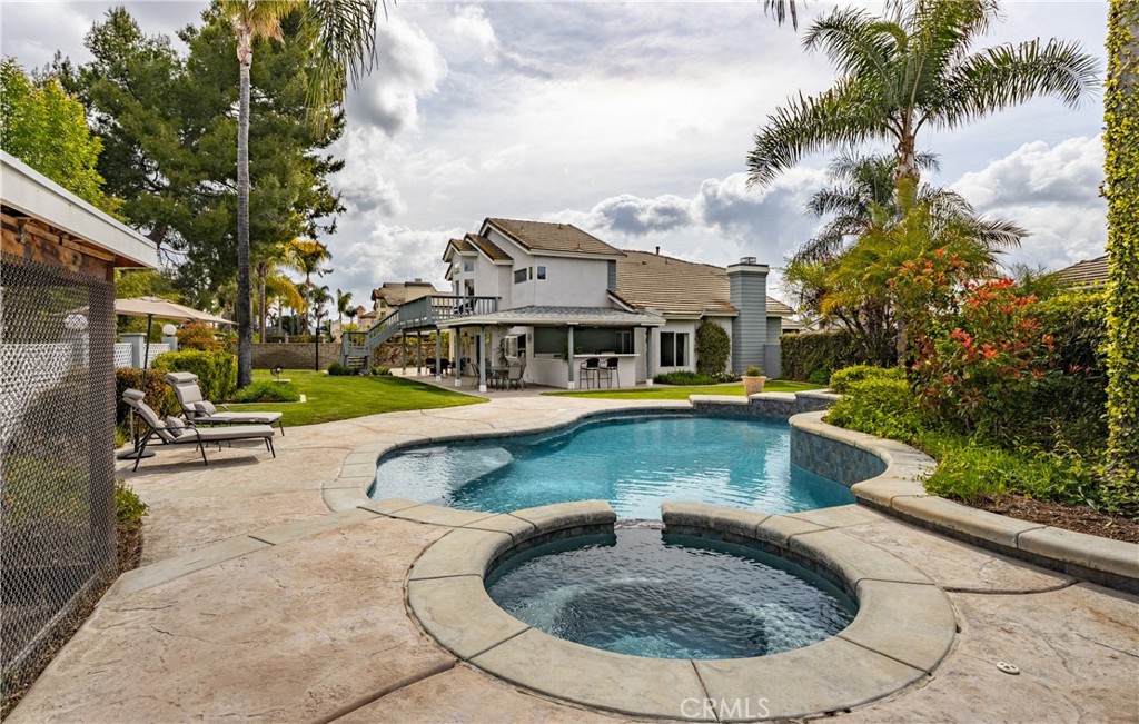 1951 Annapolis Circle Corona, CA 92881 - Photo 37 of 42 a view of a house with swimming pool and sitting area