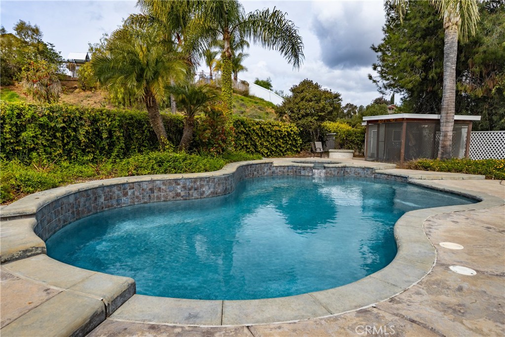 1951 Annapolis Circle Corona, CA 92881 - Photo 38 of 42 a view of a swimming pool with a yard