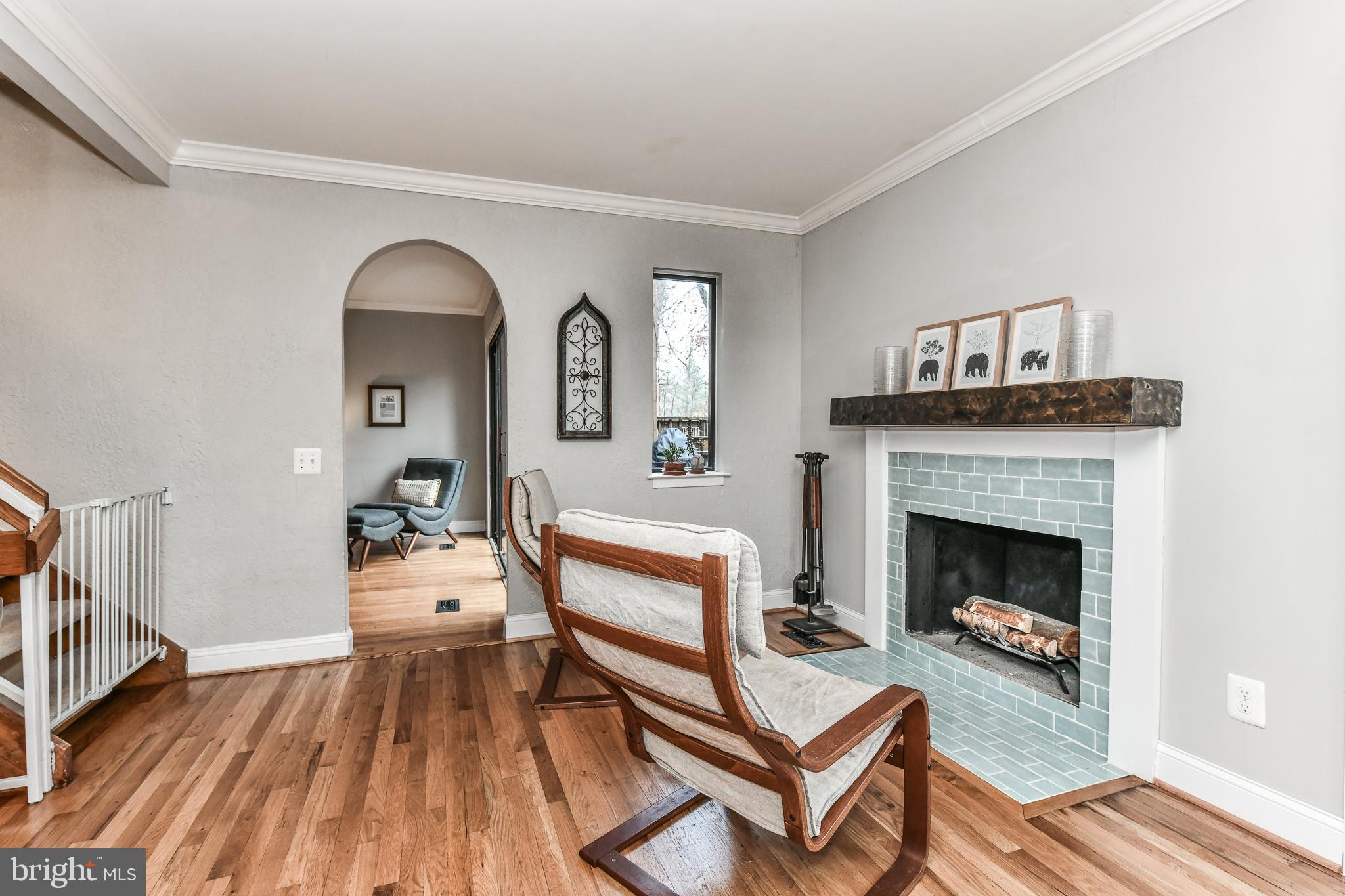 1563 Scandia Circle Reston, VA 20190 - Photo 22 of 41 Family Room w/ Wd Burning Fireplace & Door to Deck