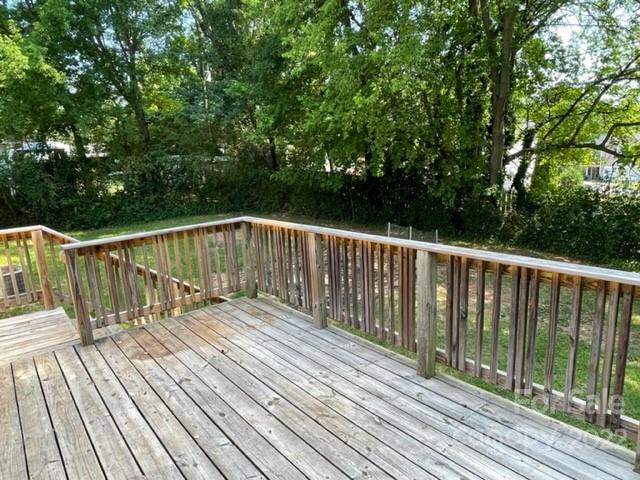 178 Quail Ridge Lane Fort Mill, SC 29708 - Photo 21 of 25 a view of deck with wooden floor and fence