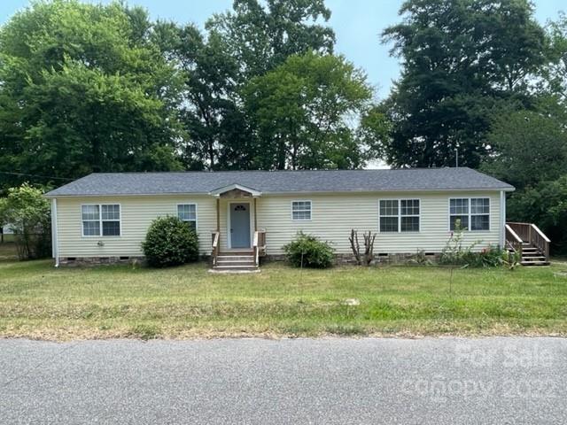 178 Quail Ridge Lane Fort Mill, SC 29708 - Photo 23 of 25 a view of a yard in front of a house with large tree