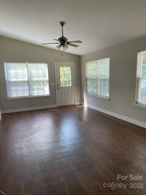 178 Quail Ridge Lane Fort Mill, SC 29708 - Photo 6 of 25 an empty room with wooden floor fan and windows