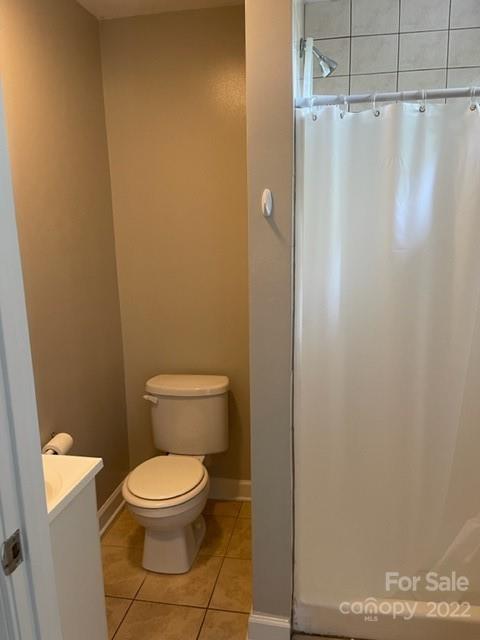 178 Quail Ridge Lane Fort Mill, SC 29708 - Photo 9 of 25 a white toilet sitting next to a shower