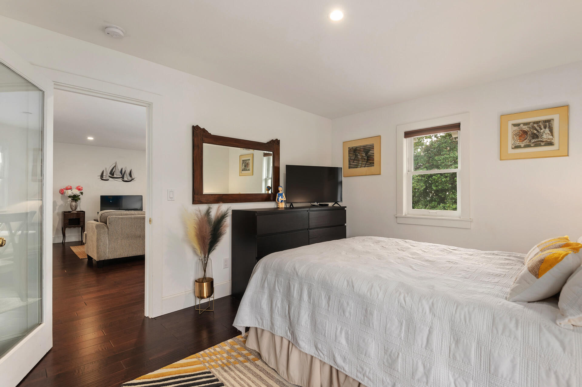 Undisclosed Address Santa Barbara, CA 93101 - Photo 16 of 27 a spacious bedroom with a bed and wooden floor