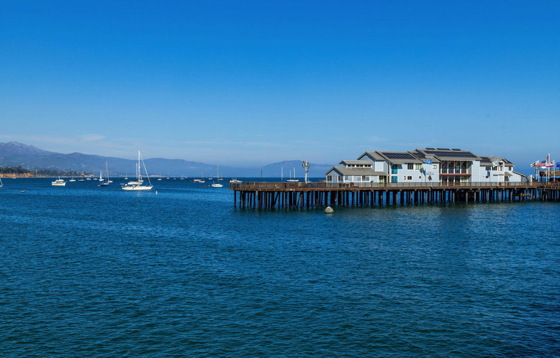 Undisclosed Address Santa Barbara, CA 93101 - Photo 19 of 27 a view of a big room with balcony and ocean view