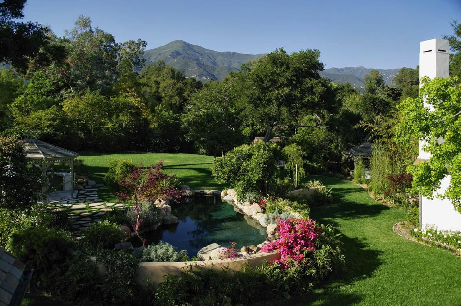 Undisclosed Address Santa Barbara, CA 93101 - Photo 21 of 27 a view of a garden with a flower garden