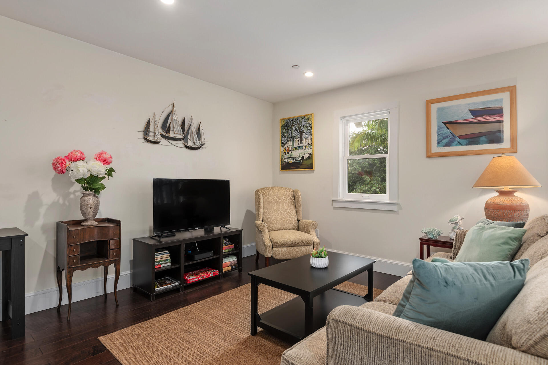 Undisclosed Address Santa Barbara, CA 93101 - Photo 9 of 27 a living room with furniture and a flat screen tv